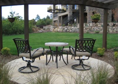 Flagstone | Pergola | Lawn | Boulder Wall
